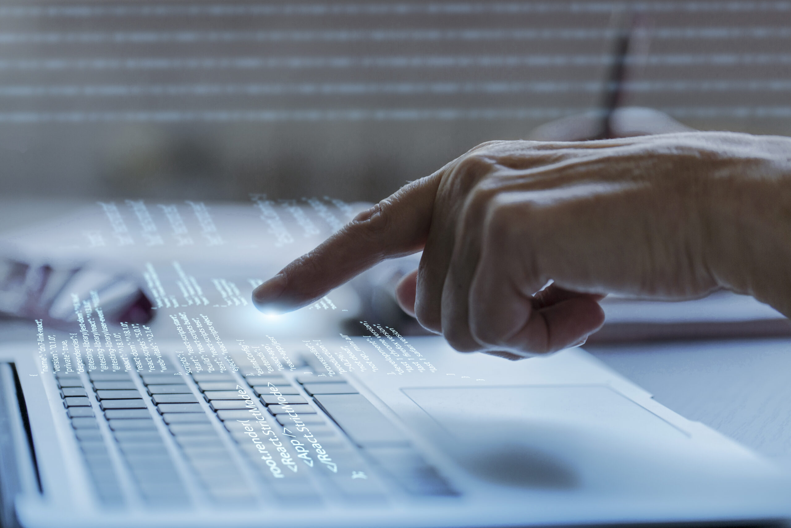 programming-background-with-person-working-with-codes-computer-scaled